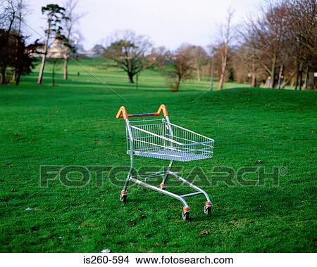 Shopping trolley left in park View Large Photo Image Picture - Shopping trolley left in park. Fotosearch