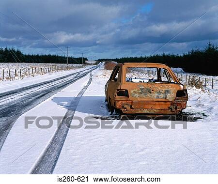 Abandoned car in snow by road View Large Photo Image Stock Image - Abandoned car in snow by road. Fotosearch