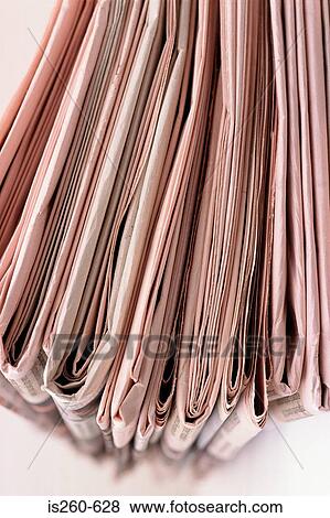 Folded newspapers View Large Photo Image Stock Photo - Folded newspapers. Fotosearch