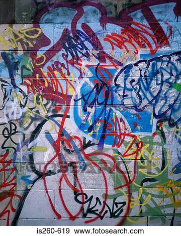 Graffiti on wall View Large Photo Image Stock Photo - Graffiti on wall. Fotosearch
