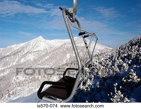 Ski-lift and snow peaks View Large Photo Image Picture - Ski-lift and snow peaks. Fotosearch