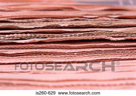 Stock Photo - Stack of newspapers. Fotosearch