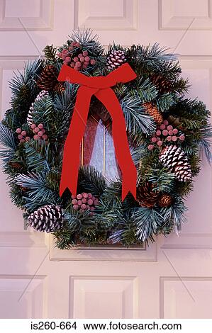 Christmas wreath on door View Large Photo Image Picture - Christmas wreath on door. Fotosearch