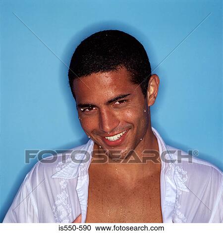 Stock Image - Portrait of young hispanic man. Fotosearch