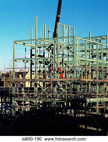 Men working on construction site View Large Photo Image Stock Image - Men working on construction site. Fotosearch