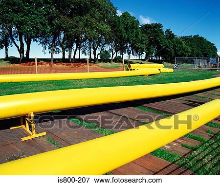 Yellow industrial piping View Large Photo Image Stock Photo - Yellow industrial piping. Fotosearch