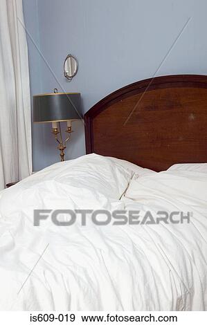 Crumpled sheets on bed View Large Photo Image Stock Photo - Crumpled sheets on bed. Fotosearch
