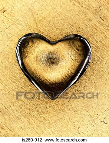 Glass heart on table View Large Photo Image Stock Image - Glass heart on table. Fotosearch