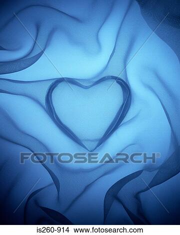 Heart covered in blue silk View Large Photo Image Picture - Heart covered in blue silk. Fotosearch