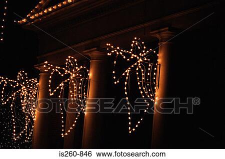 Illuminated angels on column View Large Photo Image Stock Photograph - Illuminated angels on column. Fotosearch