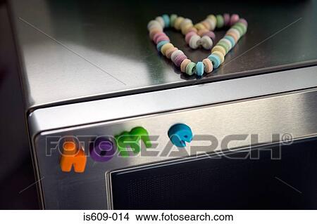 Picture - Letter magnets on refrigerator. Fotosearch