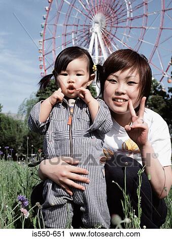 Portrait of a mother and daughter View Large Photo Image Stock Image - Portrait of a mother and daughter. Fotosearch