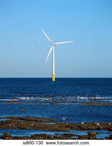 Stock Image - Wind turbine in sea. Fotosearch