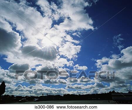 Stock Photograph - Clouds in the sky. Fotosearch
