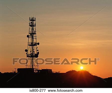 Communication tower at sunset View Large Photo Image Stock Photo - Communication tower at sunset. Fotosearch