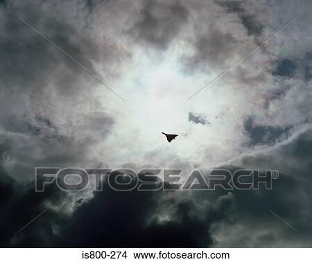 Fighter plane against stormy sky View Large Photo Image Picture - Fighter plane against stormy sky. Fotosearch