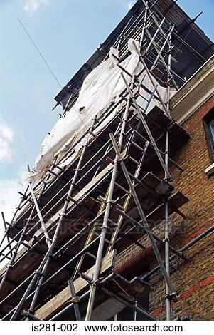 Scaffolding on a house View Large Photo Image Stock Image - Scaffolding on a house. Fotosearch