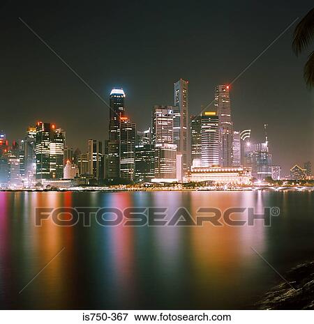 Stock Photo - Singapore skyline at night. Fotosearch