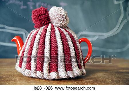 Teapot in tea cosy View Large Photo Image Stock Photograph - Teapot in tea cosy. Fotosearch