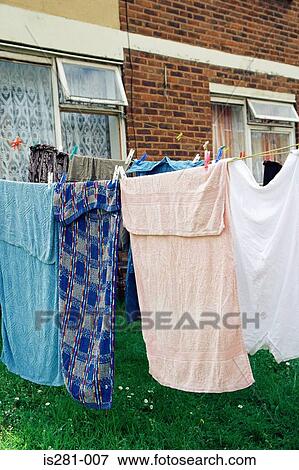 Towels on a washing line View Large Photo Image Stock Photo - Towels on a washing line. Fotosearch