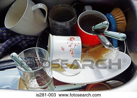 Washing up in a sink View Large Photo Image Stock Image - Washing up in a sink. Fotosearch