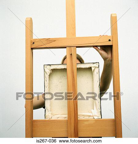 Artist with square picture frame View Large Photo Image Stock Photograph - Artist with square picture frame. Fotosearch