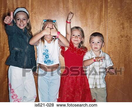 Children giving thumbs up View Large Photo Image Stock Photo - Children giving thumbs up. Fotosearch