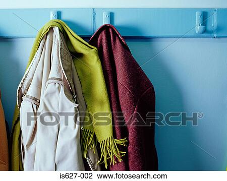 Coats on hooks View Large Photo Image Stock Image - Coats on hooks . Fotosearch