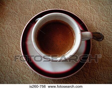 Coffee cup on table View Large Photo Image Stock Photograph - Coffee cup on table. Fotosearch