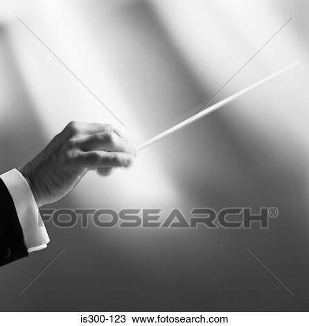 Conductor with baton View Large Photo Image Stock Image - Conductor with baton . Fotosearch