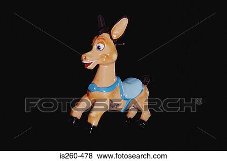 Donkey toy ride for children View Large Photo Image Stock Photo - Donkey toy ride for children. Fotosearch