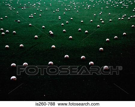 Stock Photo - Footballs in field. Fotosearch