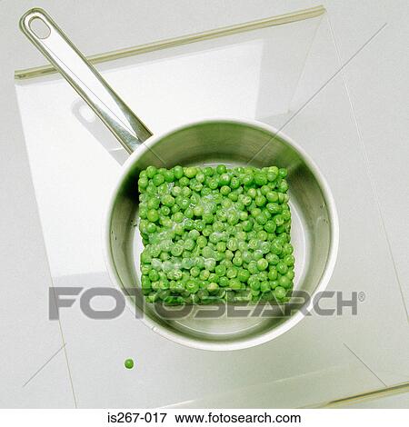 Frozen peas in saucepan View Large Photo Image Stock Photo - Frozen peas in saucepan. Fotosearch
