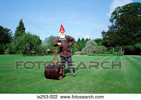 Stock Image - Garden gnome gardening. Fotosearch