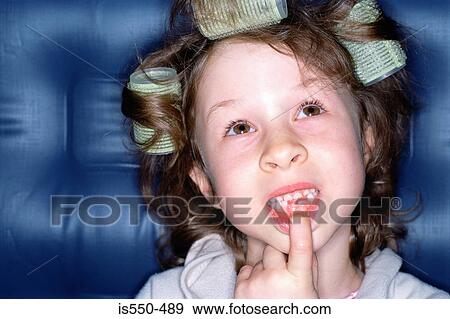 Girl showing two new teeth View Large Photo Image Stock Photo - Girl showing two new teeth. Fotosearch