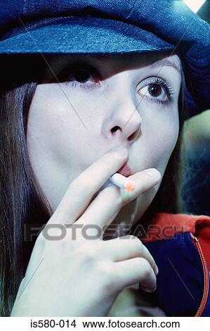 Girl smoking View Large Photo Image Picture - Girl smoking. Fotosearch