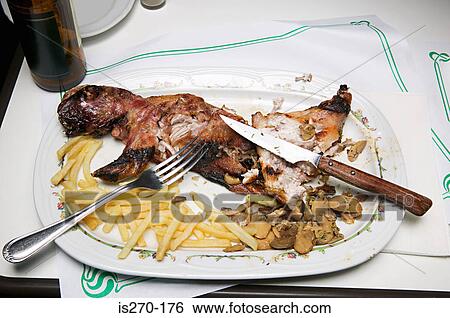 Stock Photograph - Half eaten meal. Fotosearch