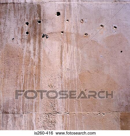 Holes in concrete wall View Large Photo Image Stock Photograph - Holes in concrete wall. Fotosearch
