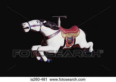 Stock Image - Horse toy ride for children. Fotosearch