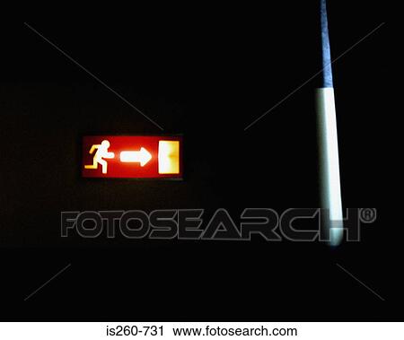Illuminated exit sign View Large Photo Image Stock Image - Illuminated exit sign. Fotosearch
