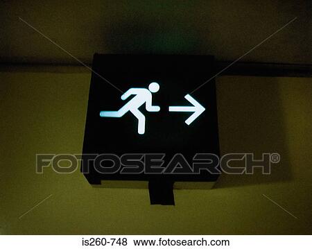 Illuminated exit sign View Large Photo Image Stock Photo - Illuminated exit sign. Fotosearch