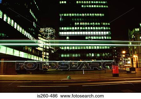 Illuminated office building View Large Photo Image Stock Photograph - Illuminated office building. Fotosearch