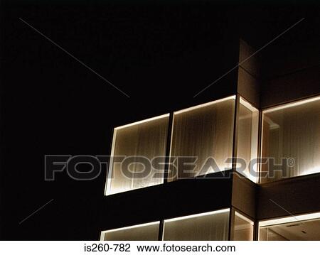Illuminated windows on multistorey building View Large Photo Image Stock Image - Illuminated windows on multistorey building. Fotosearch