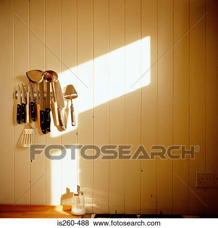 Kitchen utensils on wall View Large Photo Image Stock Photo - Kitchen utensils on wall. Fotosearch
