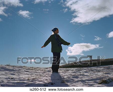 Man standing on sandy beach View Large Photo Image Stock Image - Man standing on sandy beach. Fotosearch
