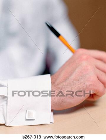 Man wearing a square cuff link View Large Photo Image Stock Photo - Man wearing a square cuff link. Fotosearch