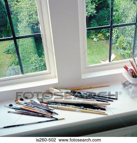 Paintbrushes on windowsill View Large Photo Image Stock Image - Paintbrushes on windowsill. Fotosearch