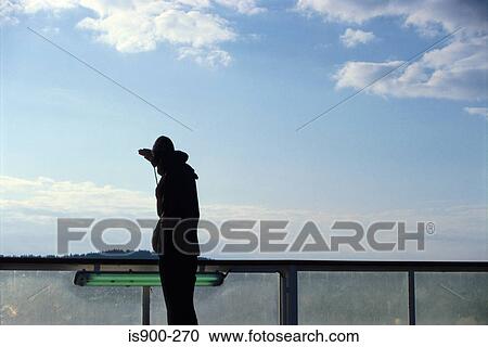 Person standing alone on ship View Large Photo Image Stock Image - Person standing alone on ship. Fotosearch