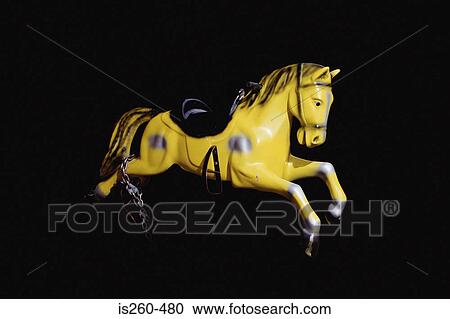 Stock Image - Pony toy ride for children. Fotosearch