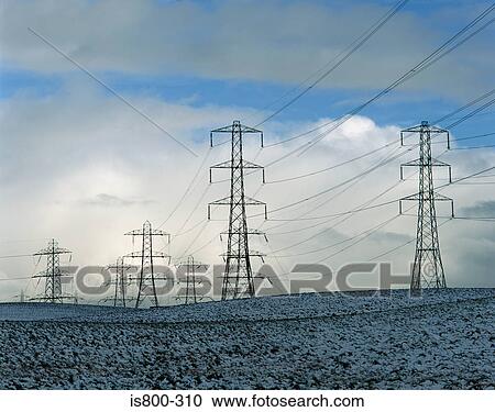 Pylons in a snowy field View Large Photo Image Stock Image - Pylons in a snowy field. Fotosearch